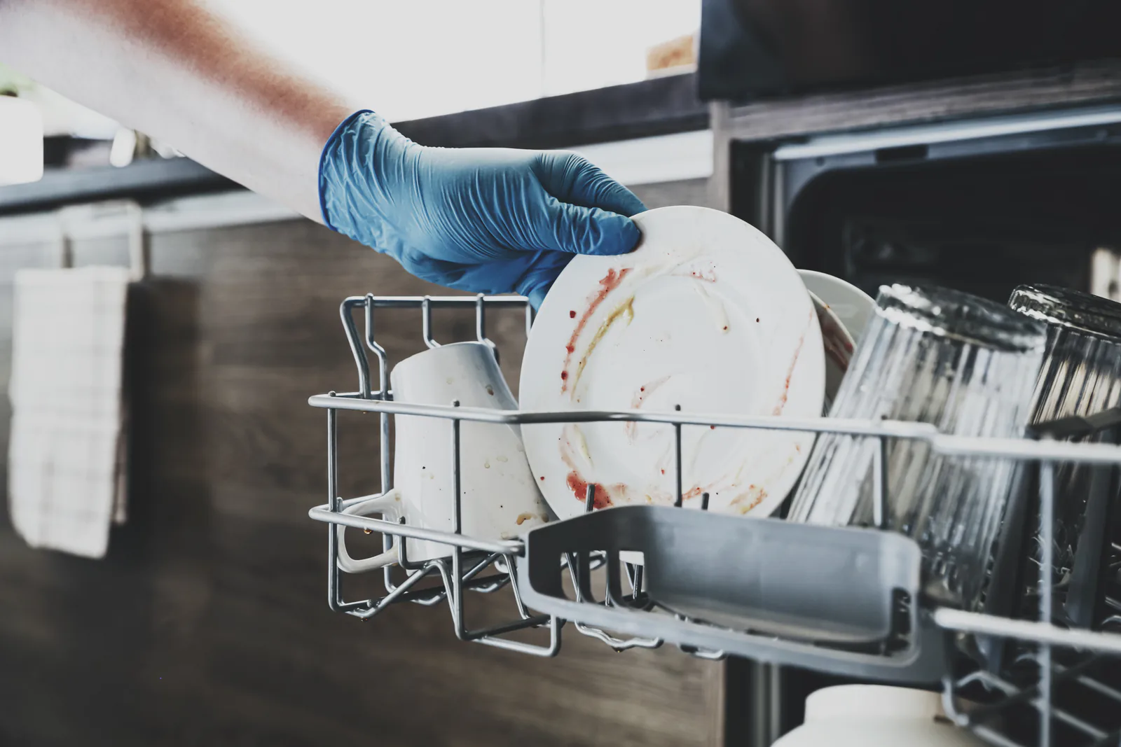 Dirty dishes coming out from the dishwasher is one of the warning signs.